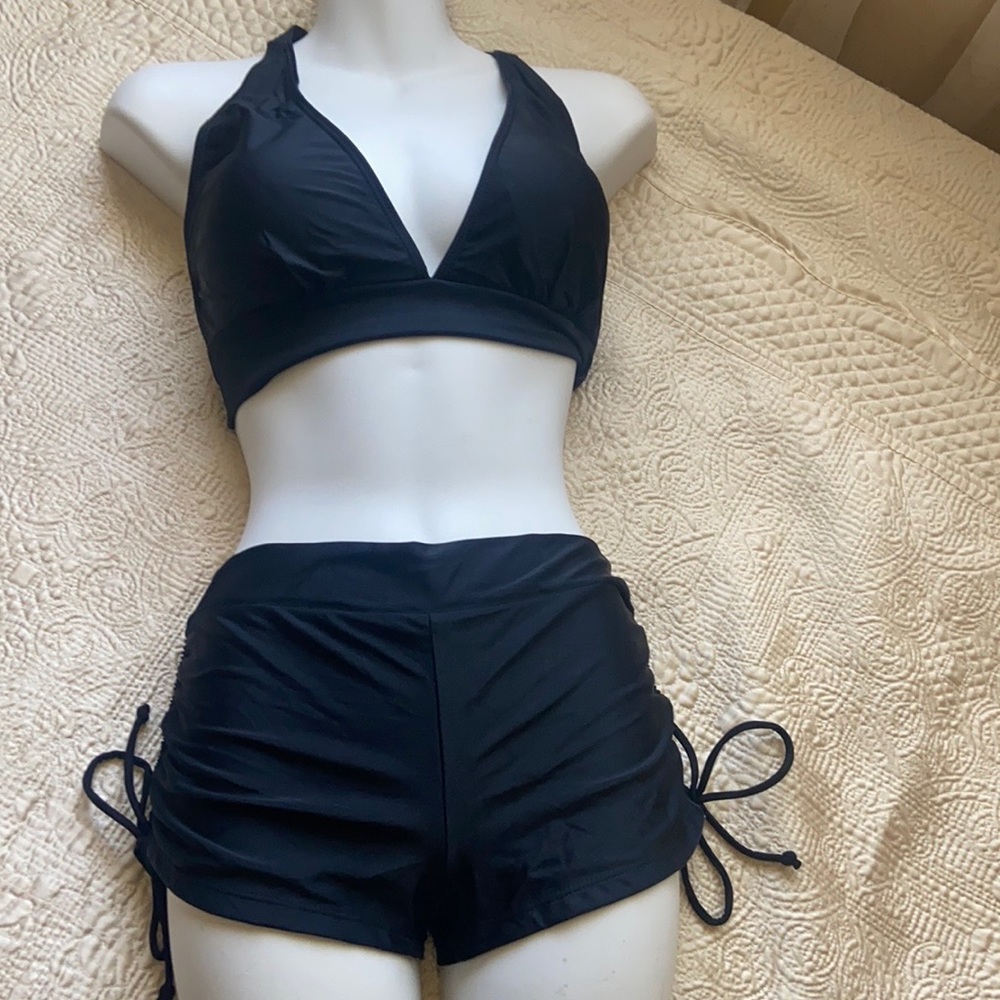 Top and bottom swimming suit.
